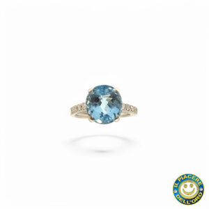 Anello Oro Bianco  con Pietra Azzurra e Diamantini